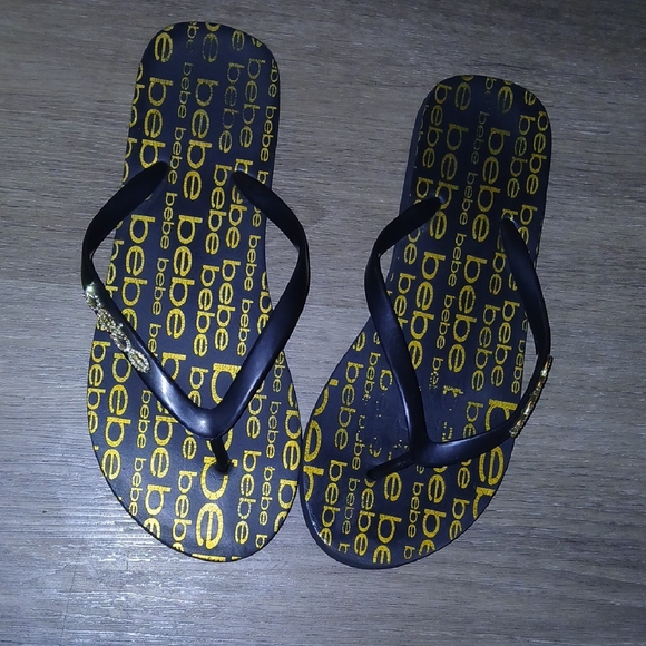 Bebe Black and Gold Flip Flops - Picture 1 of 2